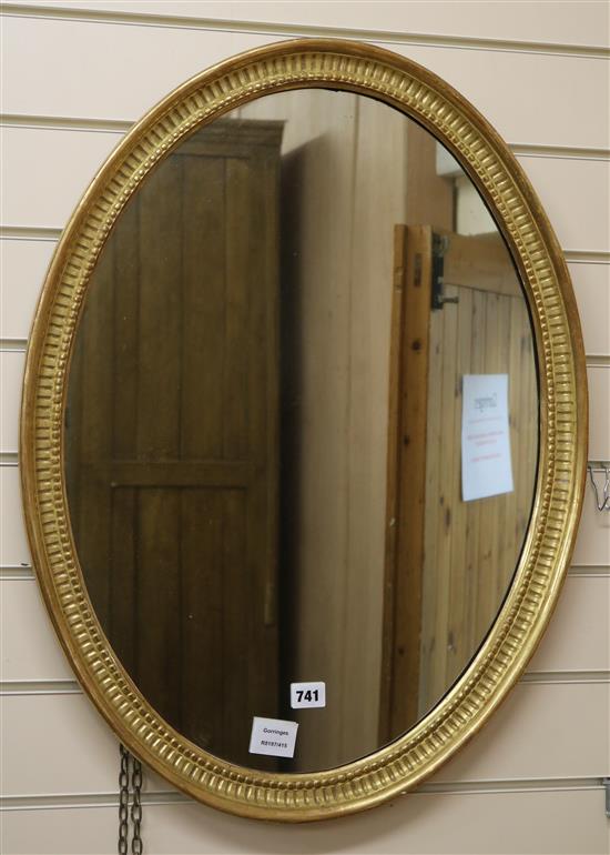 An Edwardian oval gilt framed wall mirror W.53cm